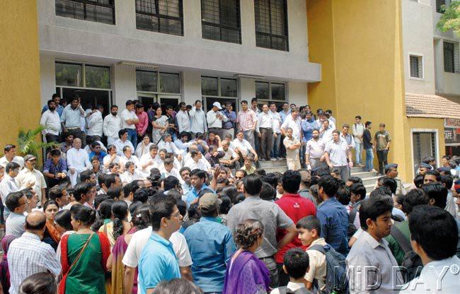Chaos: Angry parents converged at the school on Monday to protest the molestation of the child. Pic/Mohan Patil