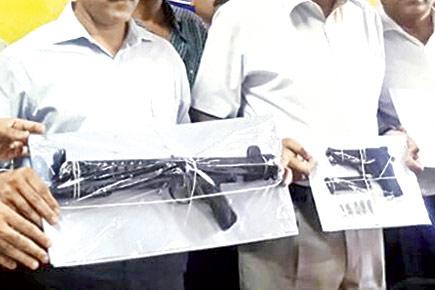 Two Mumbai bouncers held with machine gun, pistol