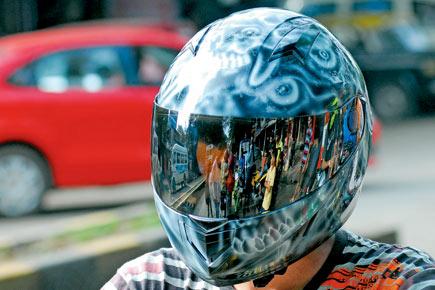 Delhi Police turn designers to encourage city's young bikers to wear helmets