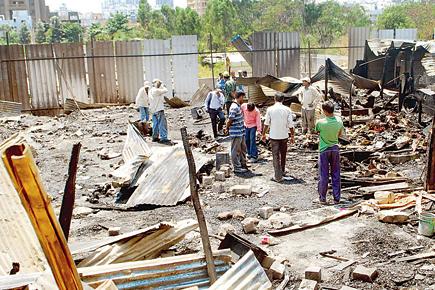 Fire burns down makeshift homes at construction site
