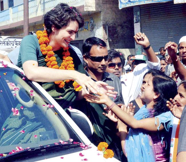 Priyanka Gandhi Vadra during an election campaign for her mother, Congress president Sonia Gandhi in Rae Bareli on Friday. Pic/PTI