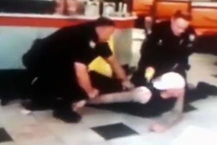 Man beats up cops despite being repeatedly tasered
