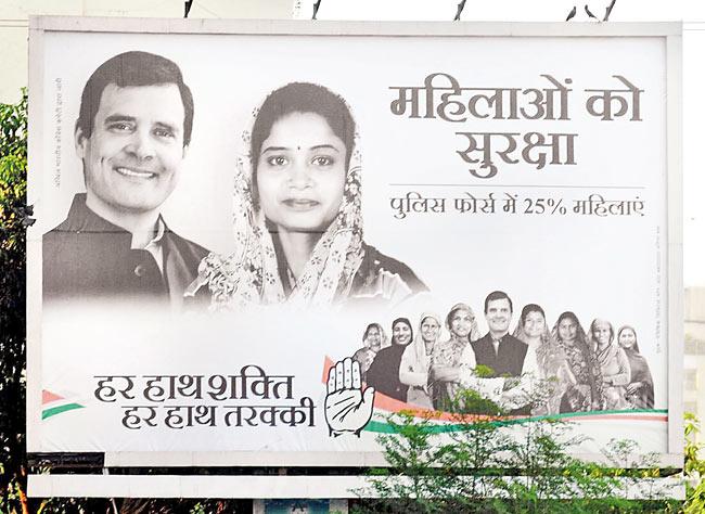 Face of the hand: Rahul Gandhi is seen smiling down at the electorate from almost all Congress banners. Pic/Nimesh Dave