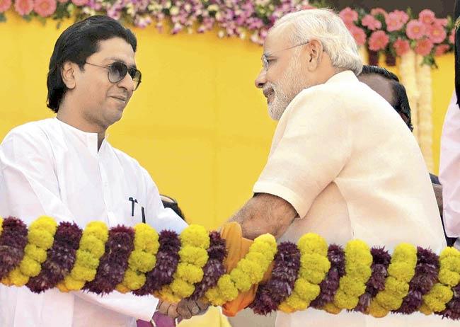 MNS chief Raj Thackeray and BJP’s prime ministerial candidate and Gujarat CM Narendra Modi greet each other at an event in Ahmedabad. File pic