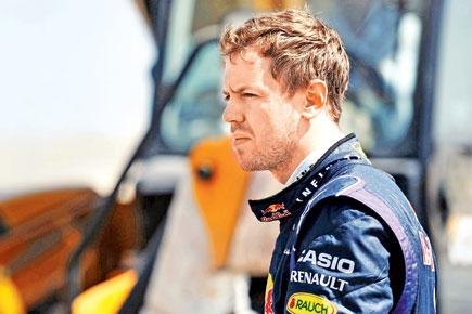 Just getting to finish line will be a success: Sebastian Vettel