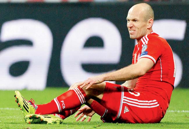 Arjen Robben reacts after a foul on Tuesday night. Pic/AFP