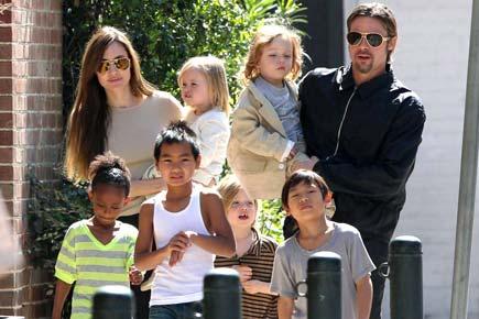 Brad Pitt feels privileged to be able to 'teach' his children