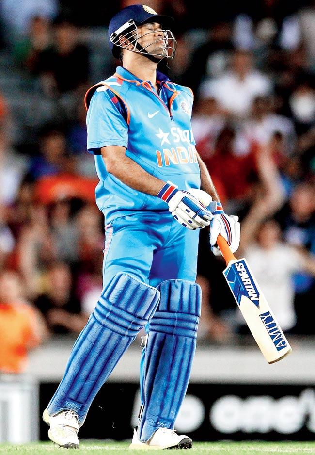 MS Dhoni has batted mainly at the number five and six positions in T20 cricket. Pic/Getty Images