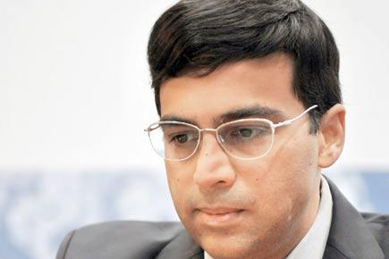 Viswanathan Anand beats top seed Aronian in first game of Candidates