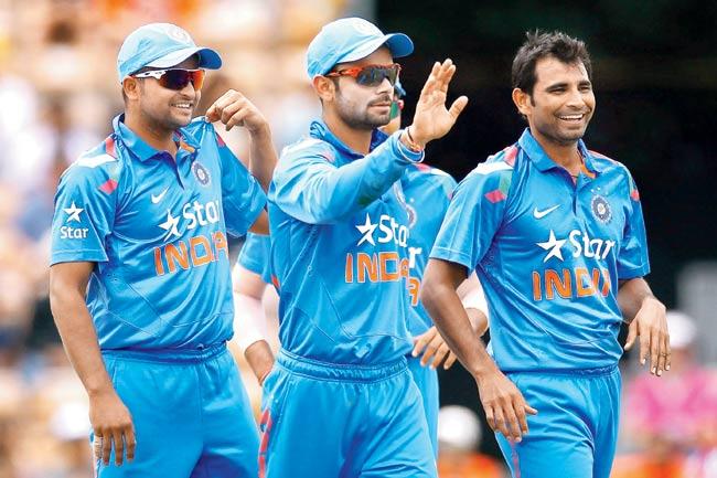 India players celebrate the wicket of Jesse Ryder during the ODI against NZ in Hamilton recently. Pic/Getty Images