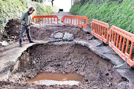 Fancy a dip? UK's largest pothole is 6-feet wide