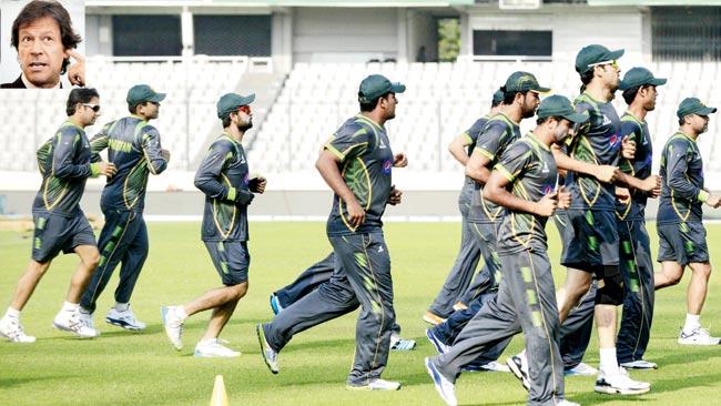 Pakistan players jog during the training session in Dhaka yesterday. PIC/AFP and (Inset) Imran Khan