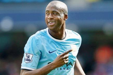EPL: Yaya Toure's hat-trick keeps Manchester City in hunt
