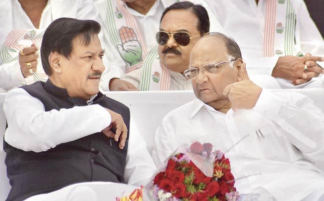 Sharad Pawar with Chief Minister Prithviraj Chavan at an election campaign rally in Satara yesterday. PIC/PTI