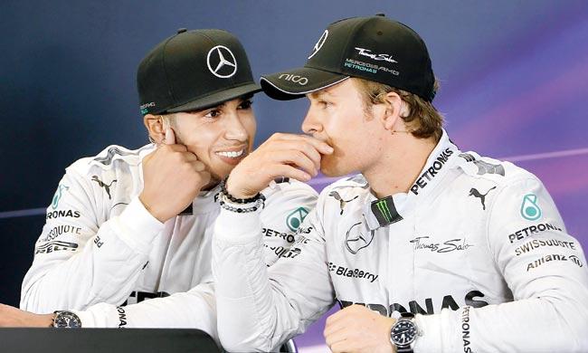 Lewis Hamilton (left) with Nico Rosberg at the Australian GP. Pic/Getty Images