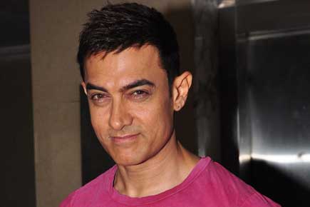 Is Aamir forcing family to sell their flats for his 'dream' bungalow?