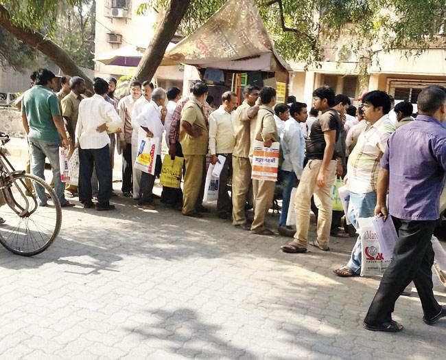 Chosen applicants line up at an illegal agent’s counter to get their documents made outside the Andheri RTO. The agents are charging exorbitant amounts to get the work done