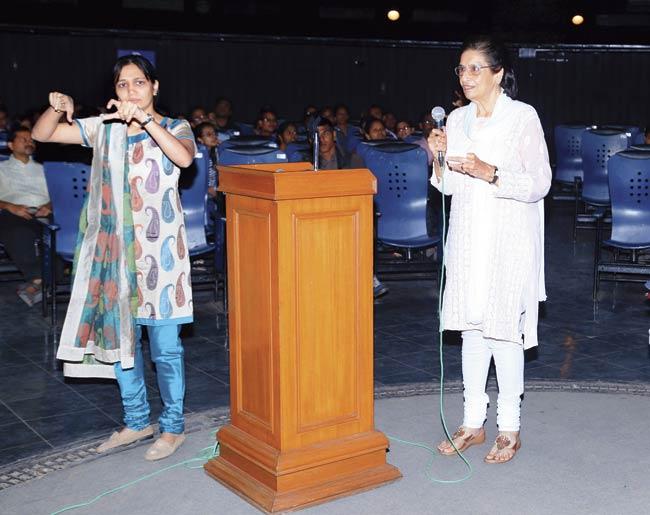 Bakul Patel, joint secretary, Nehru Centre, with sign language expert Kinjal Shah (left) during the show for hearing impaired children at Nehru Planetarium