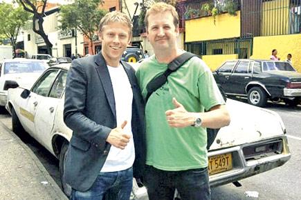 Around the world in a day! Duo make history by travelling to five continents in 24 hours