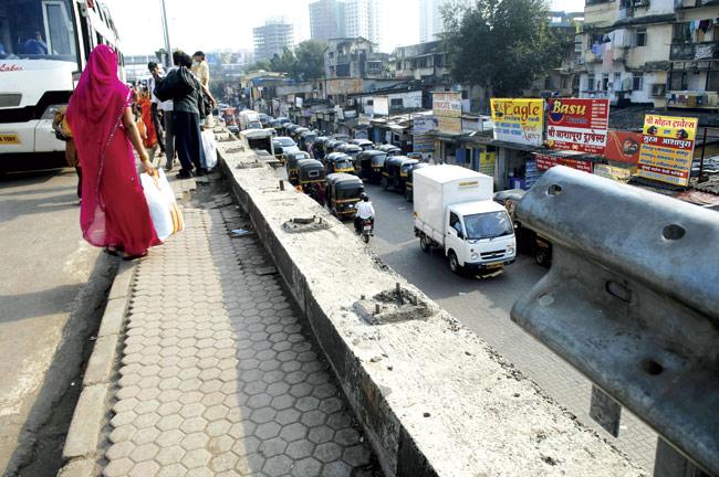 At many places, the safety railings on the Western Express Highway have gone missing. File pic