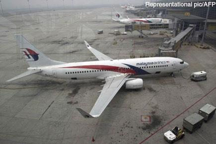 Malaysia Airlines flight: Planes sent to location of possible debris