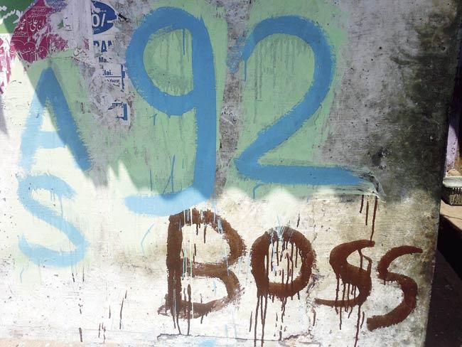 The number 92 appeared on several walls, doors and shutters in Malwani on Friday morning