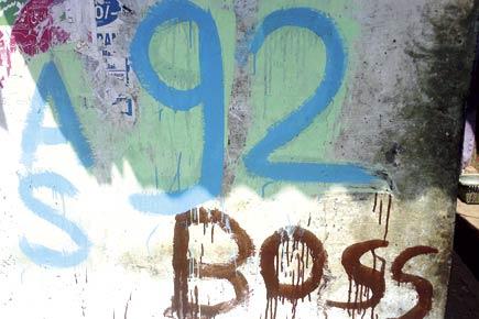 Mumbai woes: Who is scrawling 92 on Malwani walls?