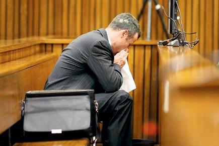 Oscar Pistorius vomits after hearing Reeva's autopsy details