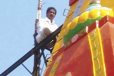 'High' drama: Man climbs atop Mumbai temple, threatens to jump