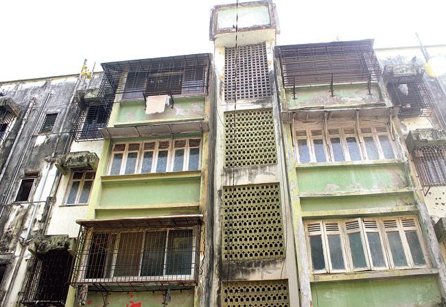 Many such buildings that should undergo redevelopment are stuck in red tape. File Photo
