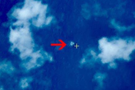 China releases satellite images of possible debris from missing Malaysian plane