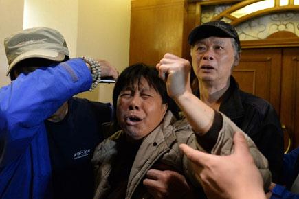 Malaysia Airlines flight MH370 crashed; relative of passenger