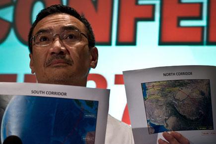 Search for missing Malaysian jet expands from Australia to Kazakhstan