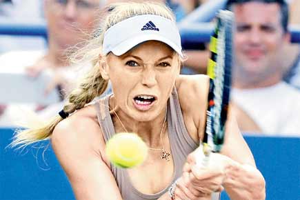 US Open: Caroline Wozniacki to face Peng Shuai in semi-finals