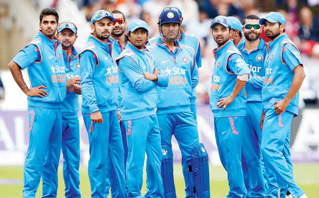 The Indians wait for a review decision for the wicket of England