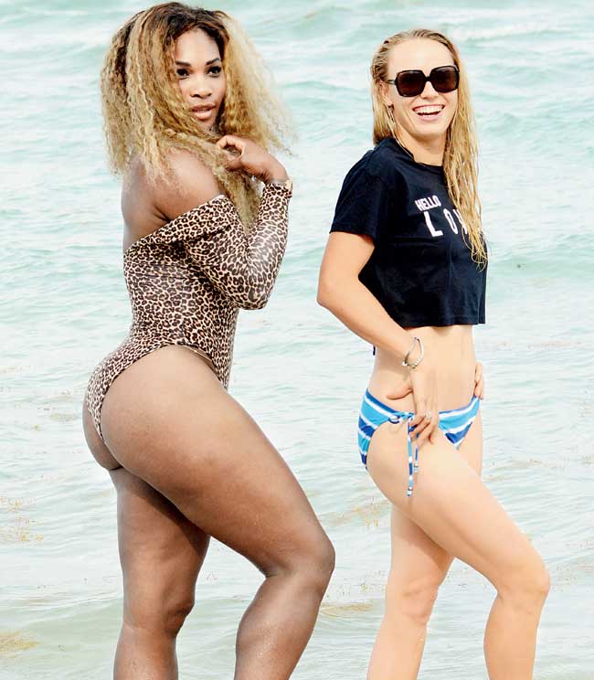 Two hot: Serena Williams and Caroline Wozniacki holiday in Miami earlier this year. Pic/Getty Images