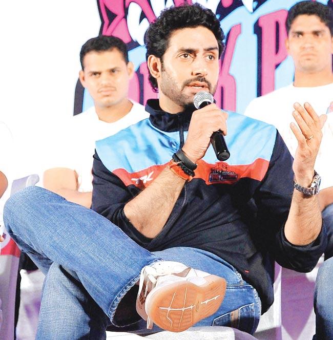 Abhishek Bachchan interacts with the media in Jaipur. Pic/PTI