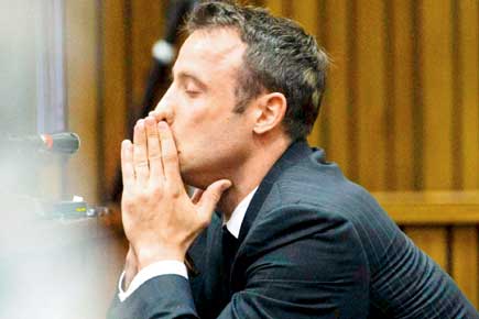 Judgment day for Oscar Pistorius in girlfriend murder trial