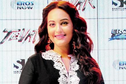 Sonakshi Sinha curls up for 'Tevar' trailer launch