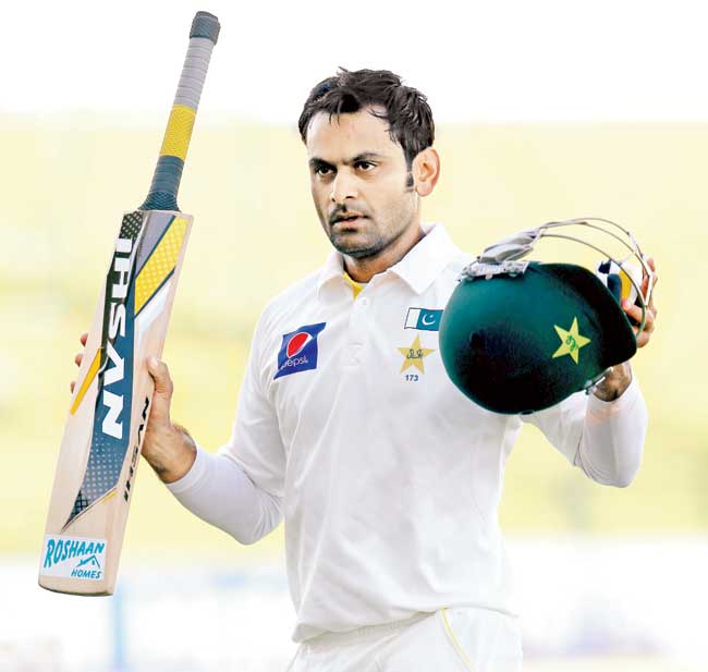 Mohammad Hafeez celebrates his 100 yesterday. Pic/Getty Images