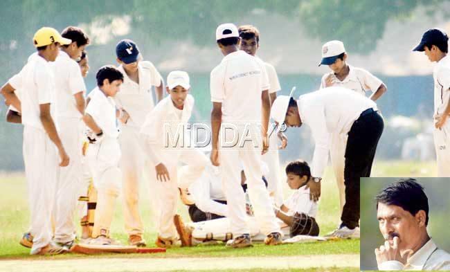 Players surround IES VN Sule Guruji