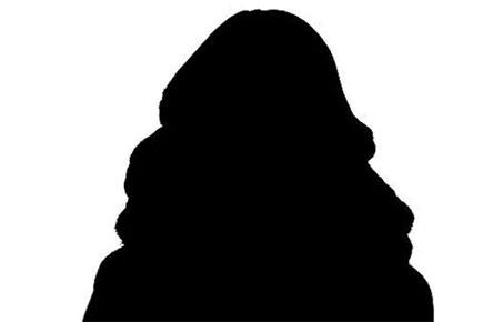 Shot in the dark: Actress lives with business partner and his wife