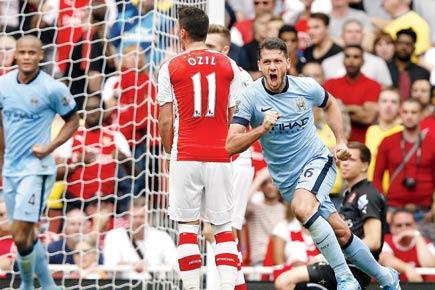EPL: Arsenal denied by late Demichelis header