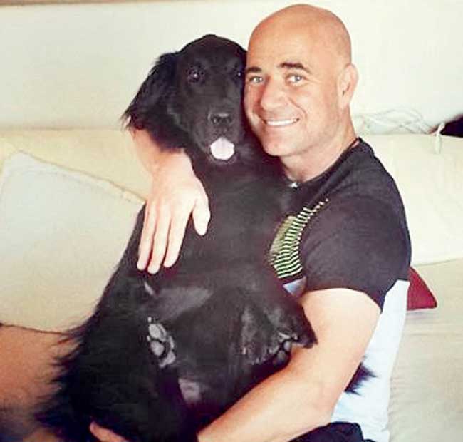 Andre Agassi with Buster