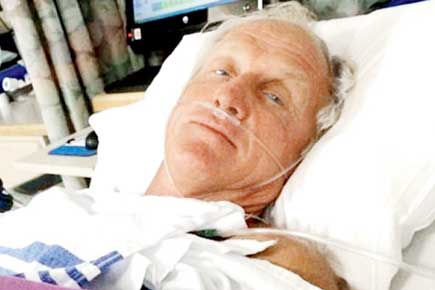 Golfer Greg Norman almost severs hand with chainsaw