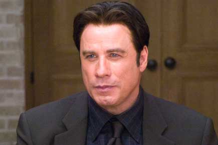 John Travolta learns the art of forging for new film