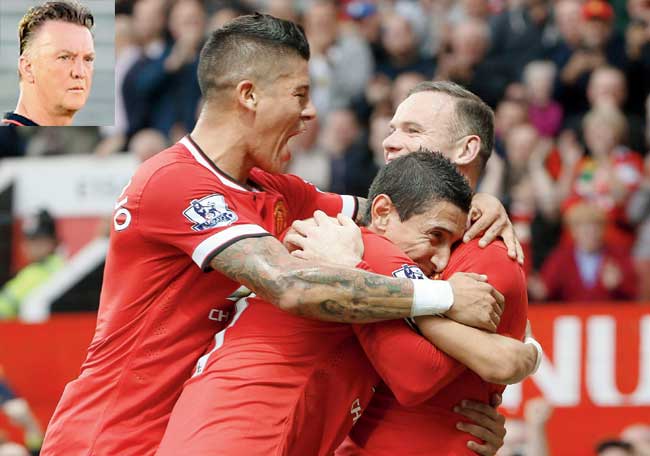 Angel di Maria (centre) celebrates scoring United’s first goal against QPR with Wayne Rooney and Marcos Rojo (left). Pic/Getty Images and (Inset) Louis van Gaal