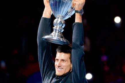 Novak Djokovic seals year-end top spot, makes semi-finals