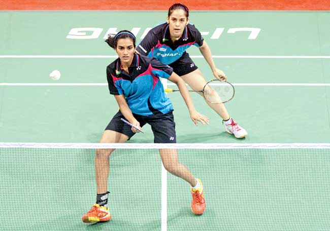 PV Sindhu (left) and Saina Nehwal during their Uber Cup match against Thailand earlier this year. Pic/Getty Images