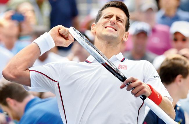 World No 1 Novak Djokovic celebrates his win over American Sam Querrey at the US Open on Saturday. Pic/AFP